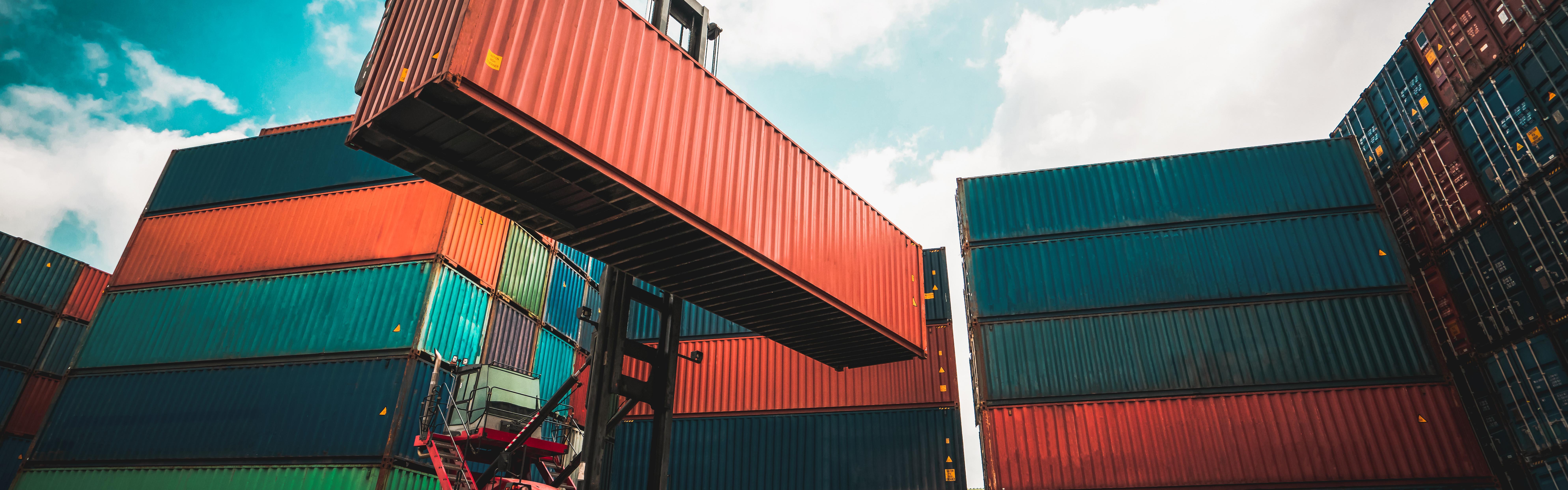 cargo container overseas shipping shipyard with airplane sky
